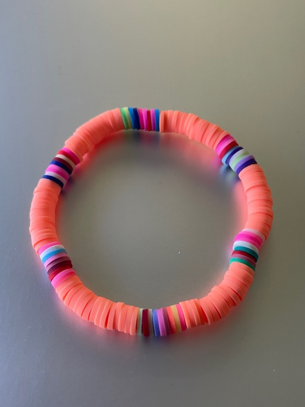 Neon Coral Stretch Disc Bracelet with Multicolor Accents